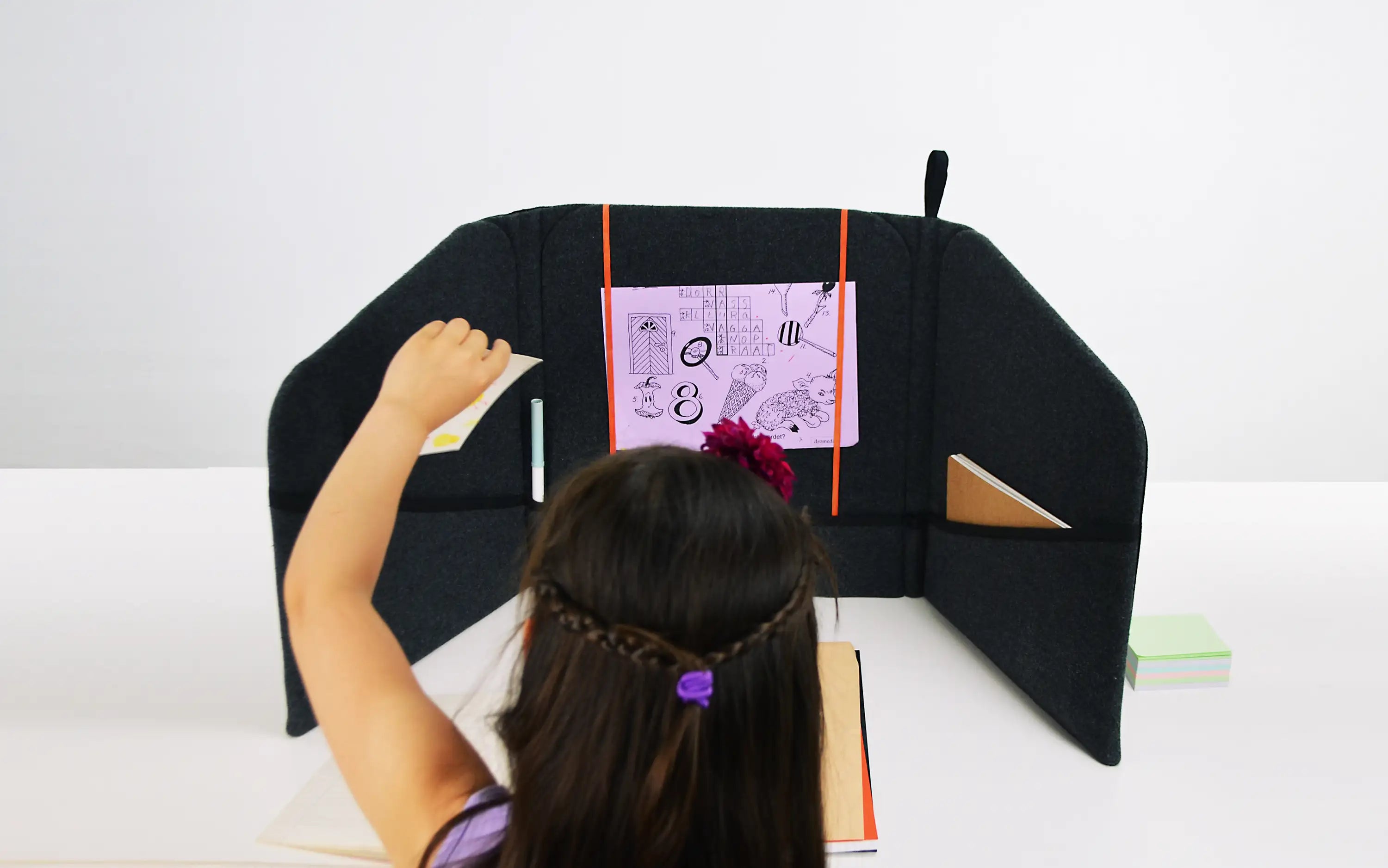 Freedesk Personal Space in black, used as a privacy screen for a focused study and learning environment.