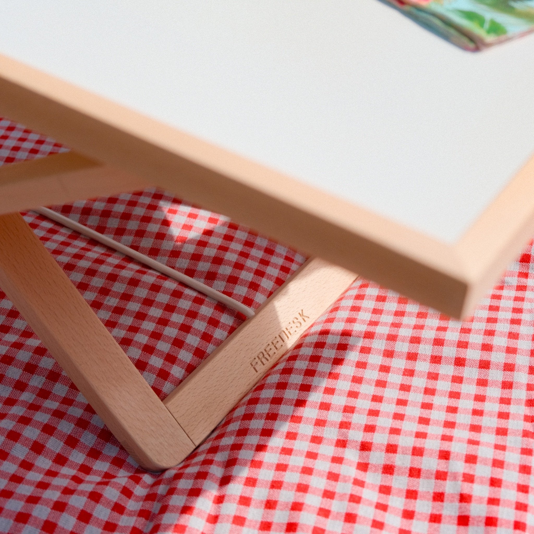 Freedesk Desk Riser Light Compact picnic picture.