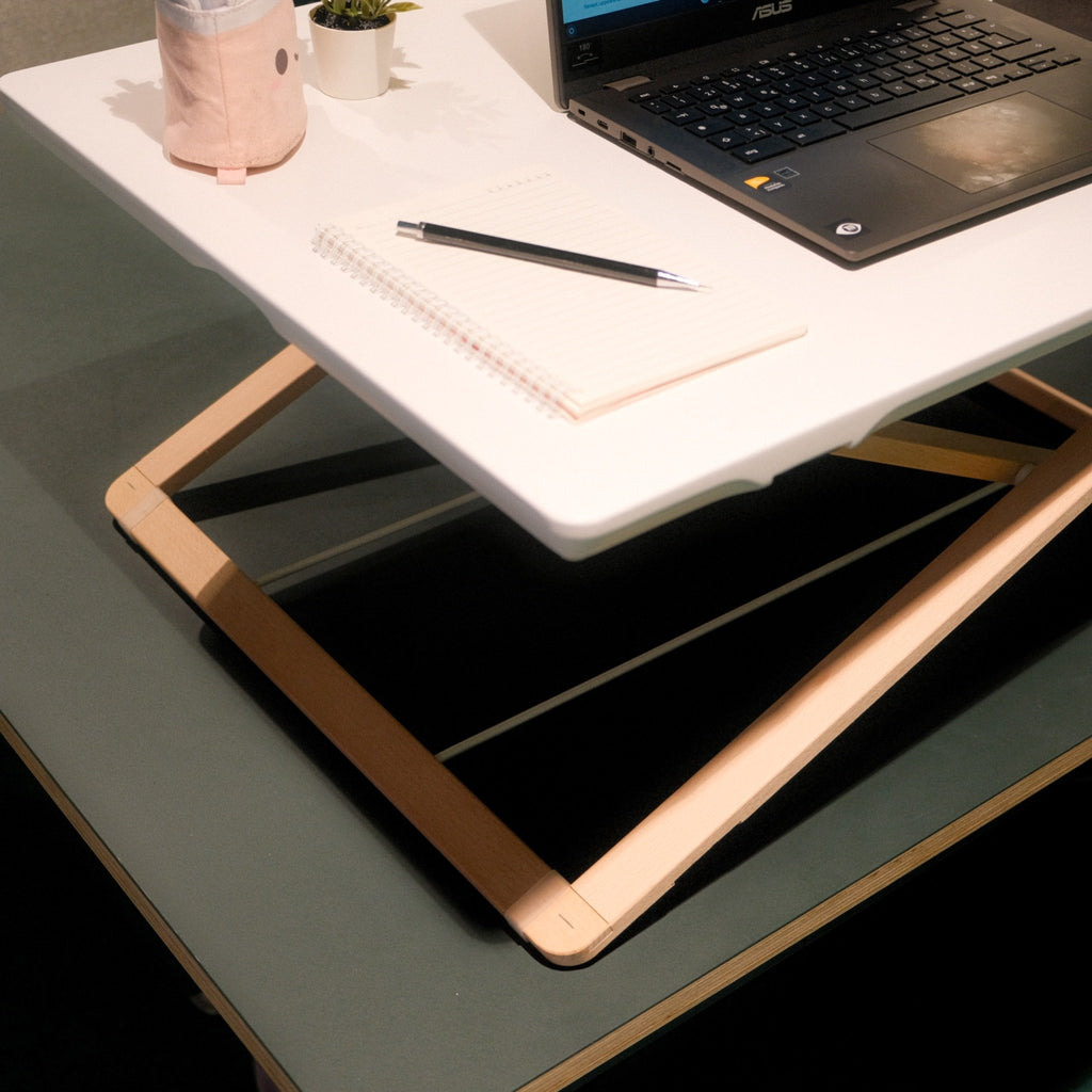 Freedesk Desk Riser Original Large on a table.