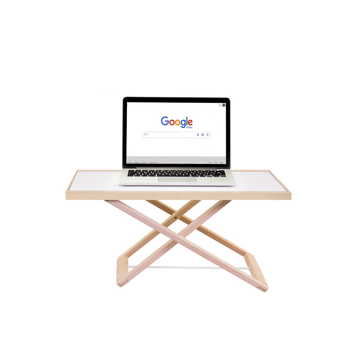 Freedesk Desk Riser Light Compact with a laptop placed on top, showing a minimalistic and sleek workspace setup.