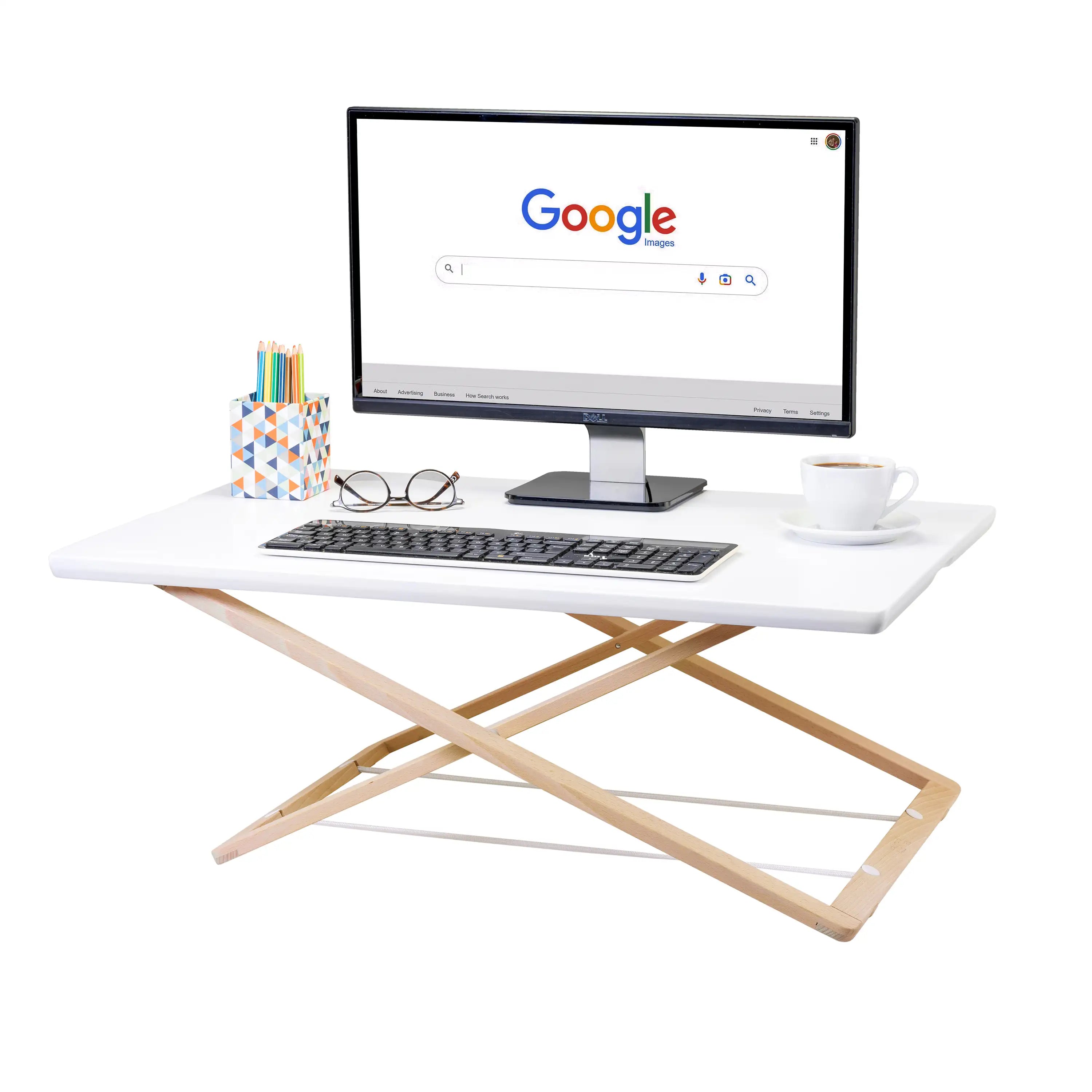 Freedesk Desk Riser Original Large with a monitor, keyboard, and coffee cup on top, showing a clean and modern workspace setup.