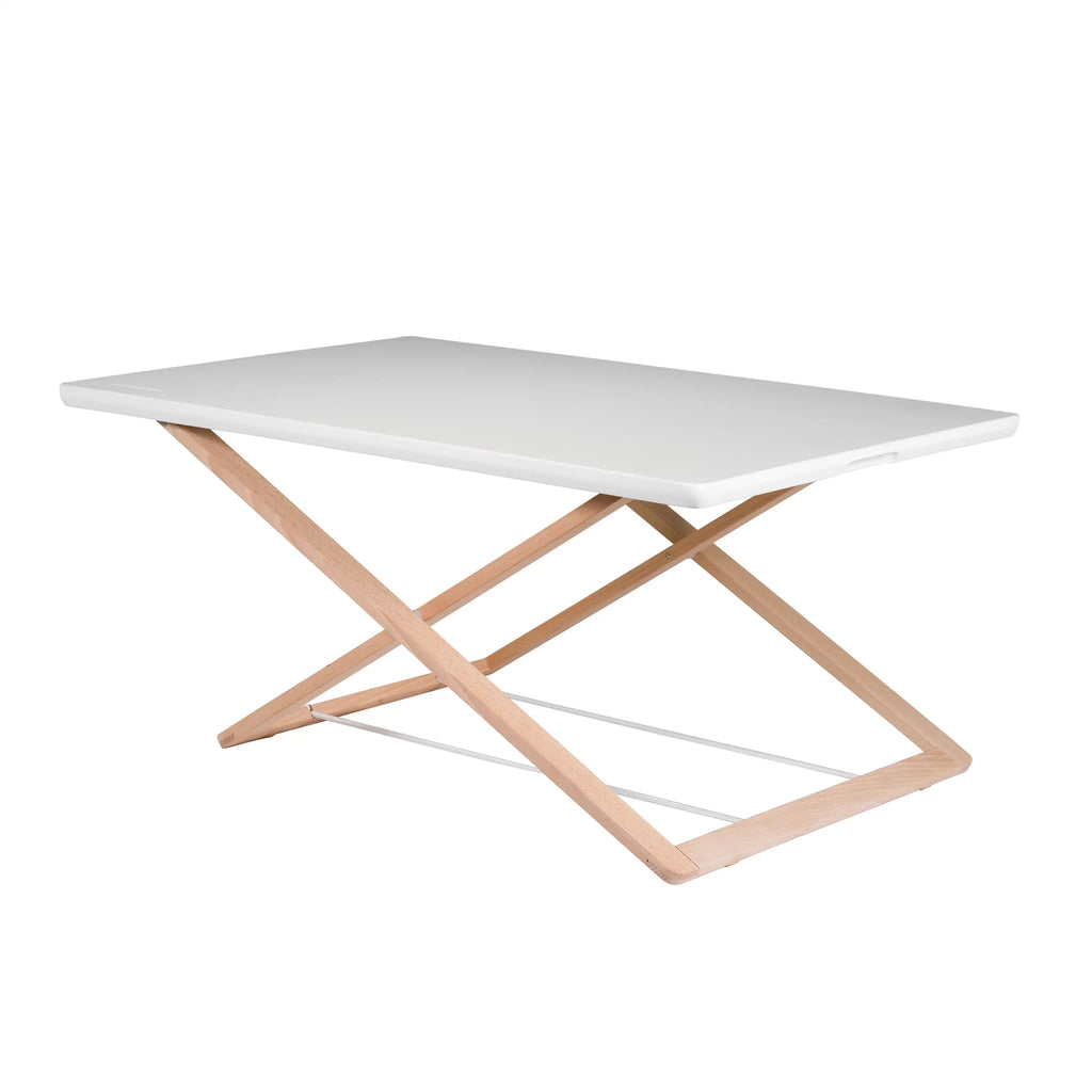 Freedesk Desk Riser Original Compact in white, featuring an adjustable wooden frame for ergonomic sit-stand flexibility.