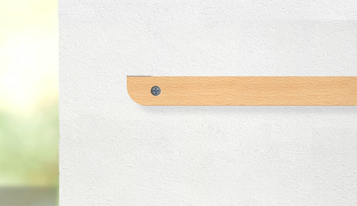 Freedesk Wall Mount for Desk Riser, securely installed on a wall for convenient storage and space-saving organization.